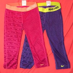 2 kids size large Nike Pro capris fits women’s xs